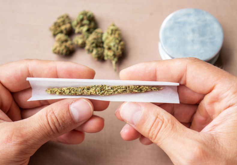 Rolling joints with cbd flower and rolling papers